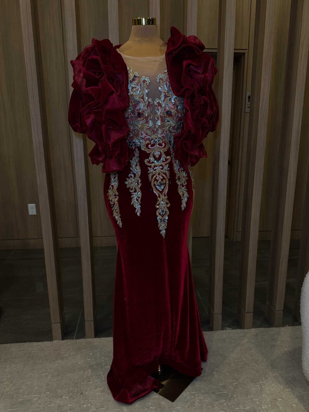 Elegant Burgundy Evening Gown with Ornate Embellishment